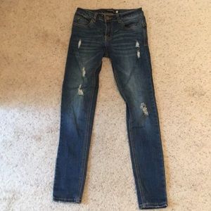 Distressed skinny jeans